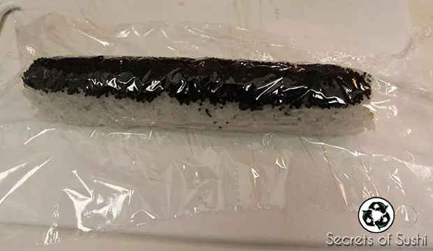 Placing cellophane onto a Dark Side Roll