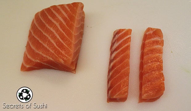 Salmon sliced for a salmon roll